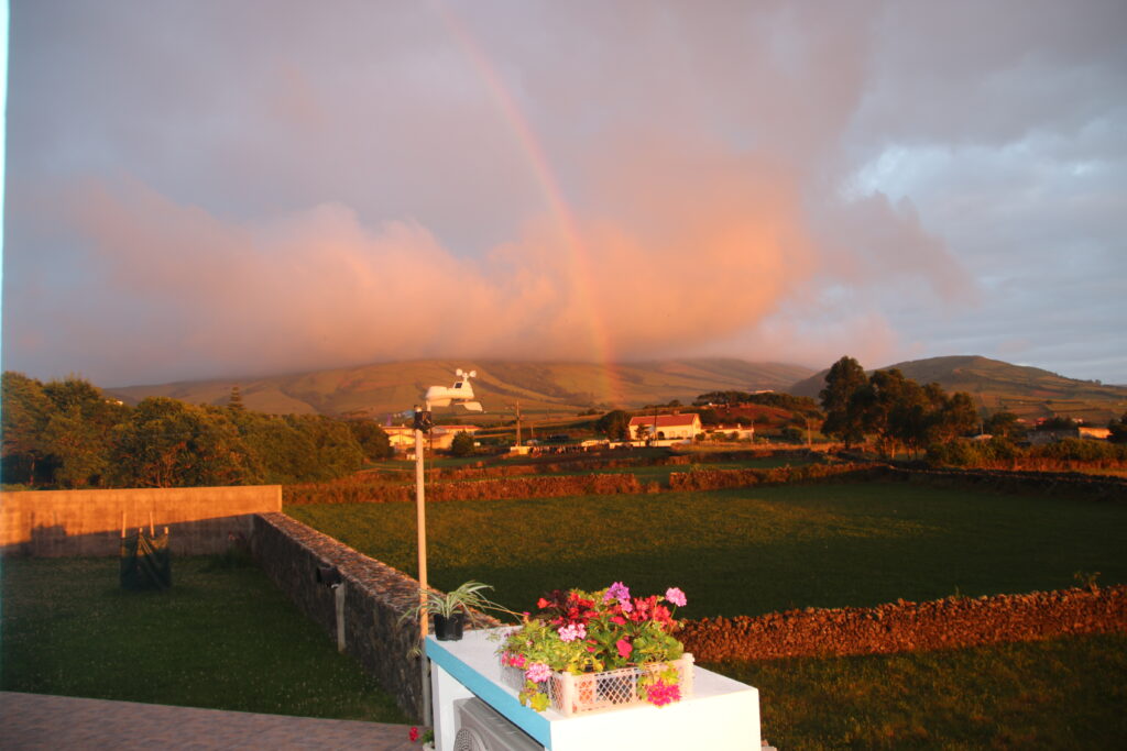 Opposite the sunrise, we had a rainbow over the Serra da Cume past our back yard. 