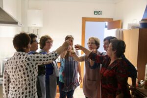 Sofia nad Christina join ladies at Porto Martins Senior's Support activity